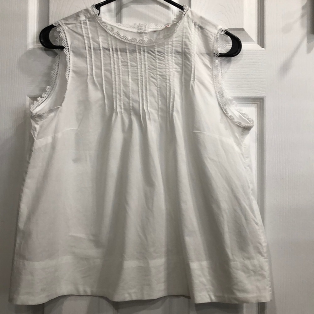 White sleeveless shirt (not a t-shirt)